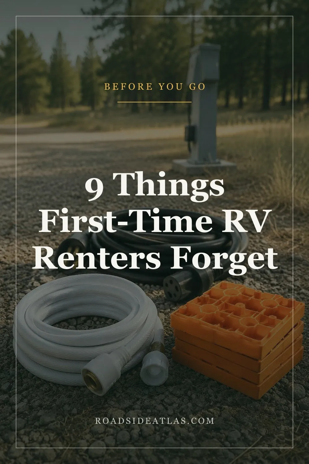 RV hookup gear on gravel beside a campsite utility pedestal: white drinking-water hose, heavy black electrical cord, and stacked orange leveling blocks